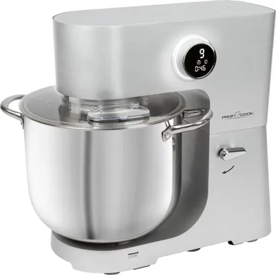 A silver kitchen mixer with a large stainless steel bowl and a clear lid is shown against a white background.
