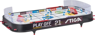 A tabletop hockey game with miniature players and goals.