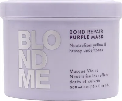 A close-up shot of a purple hair mask jar with silver lettering.