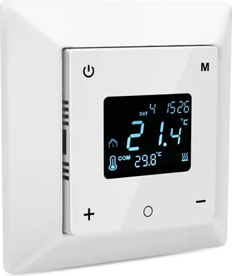 A white digital thermostat mounted on a wall.