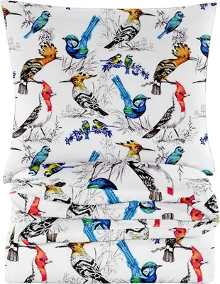 A folded duvet cover with a bird pattern.