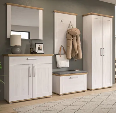 A hallway scene with furniture and accessories.