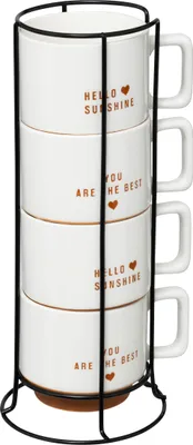 A set of four white ceramic mugs stacked in a black metal rack.
