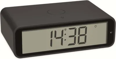 A digital alarm clock displaying the time.