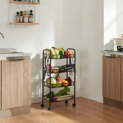 A kitchen scene with a rolling cart filled with fresh produce.