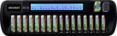 A battery charger with multiple battery slots and a digital display.
