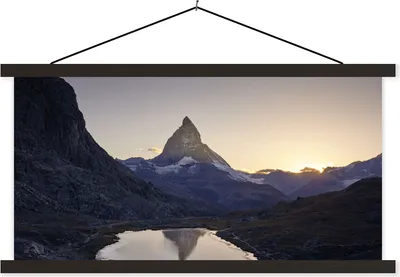 Produktbild von MuchoWow® Textilposter Das Matterhorn und der Riffelsee bei Sonnenaufgang in der Schweiz 120x60 cm mit schwarzem Rahmen - Dekoration Schlafzimmer