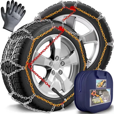 A pair of snow chains on car tires, along with a pair of gloves and a storage bag.