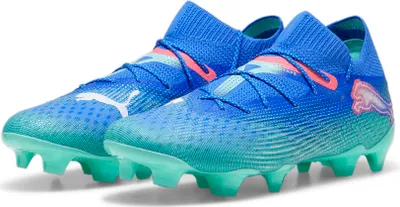 A pair of blue and teal Puma soccer cleats.
