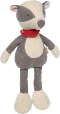 A stuffed toy badger with a red scarf.