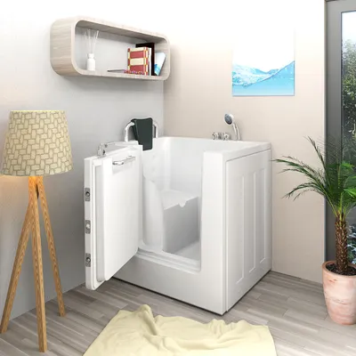 A modern bathroom with a walk-in bathtub, a floor lamp, and a shelf with decorative items.