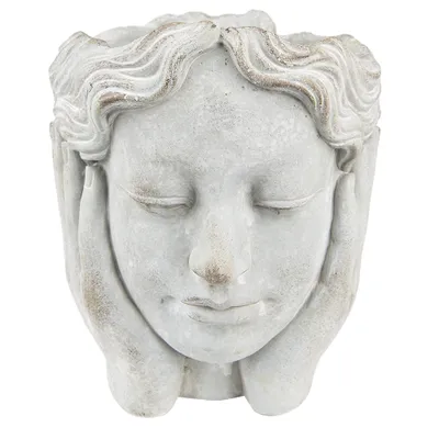 A close-up, front-facing studio shot of a gray stone planter shaped like a woman's head.