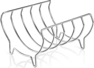 A silver metal rib rack on a white background.
