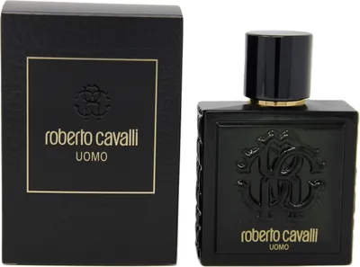A black bottle of Roberto Cavalli Uomo Eau de Toilette and its matching black box are displayed side-by-side on a white background.