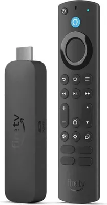 A black Amazon Fire TV Stick and its remote are shown side-by-side against a white background.