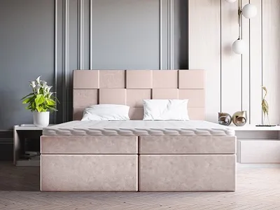 A modern bedroom setting with a pink upholstered bed as the focal point.
