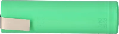 A single green cylindrical battery with a silver clip on the left side.