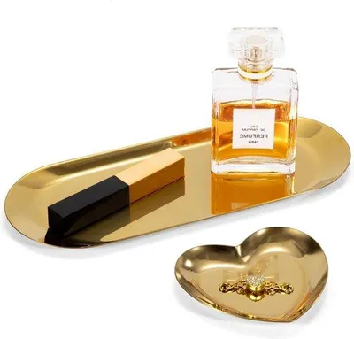 Immagine prodotto di Portacosmetici ovale in acciaio inossidabile, set da 2 pezzi, color oro.
