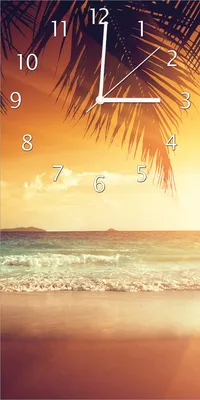 Produktbild von Wallario Design Wanduhr bedruckt, Größe 30 x 60 cm, Motiv: Sonnenuntergang am Strand in der Karibik