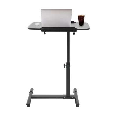 A black rolling laptop table with a laptop and a drink on it, set against a white background.