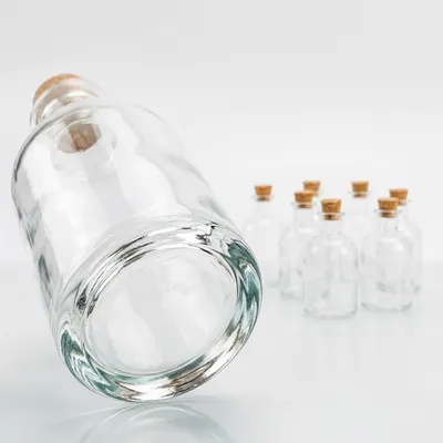 Obrázok produktu pre Sada 8 sklenených fliaš s korkovým uzáverom – 150 ml, okrúhle