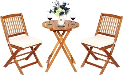 A wooden bistro set with two chairs and a table, set against a white background.