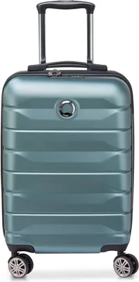A studio shot of a light green cabin trolley suitcase.