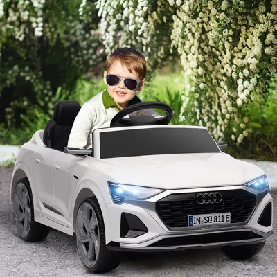Zdjęcie produktu dla AIYAPLAY Elektryczny samochód dla dzieci 12 V z pilotem 2.4G, muzyką MP3 i klaksonem, pojazd elektryczny z reflektorami, 4 koła z zawieszeniem, 3-5 km/h, dla 3-4-latków, biały