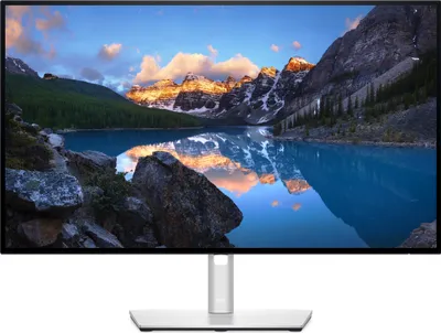 A monitor displaying a landscape image.