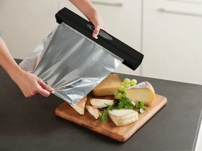 Productafbeelding van Filmsnijder Perfect Cutter - Dispenser voor alle standaardrollen Vershoudfolie en aluminiumfolie tot B: 33 cm