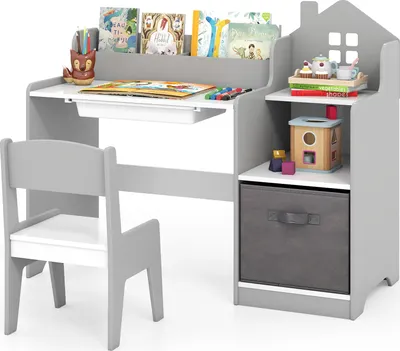A child's desk and chair set with storage.