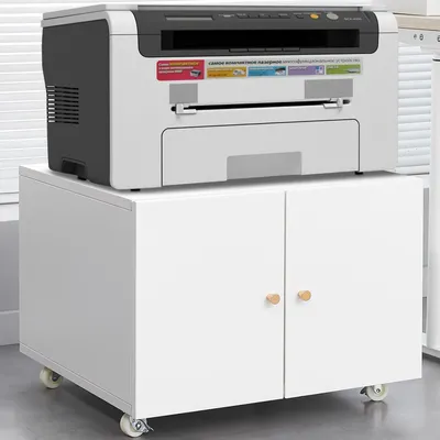 A white printer stand with a printer on top.