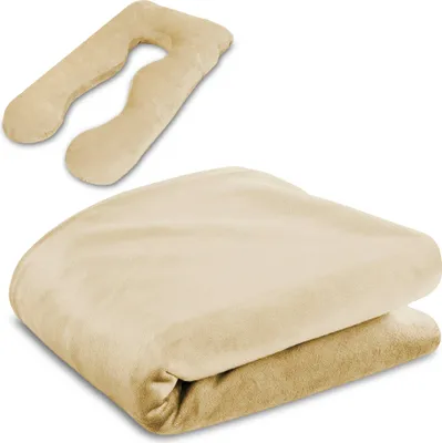 A U-shaped pregnancy pillow and a folded blanket are displayed against a white background.