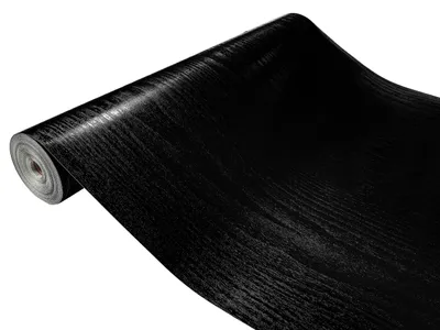 A roll of black wood-grain contact paper is shown on a white background.