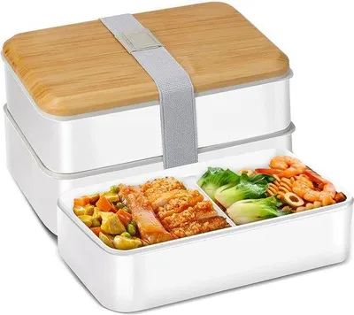 Productafbeelding van Unyqoos® Bento-lunchbox, 1400 ml, 2-laags met compartimenten en bestek (lepel + vork), geschikt voor de magnetron en vaatwasser, PP, wit, 18,5 x 10,6 x 11,8 cm, voor kinderen en volwassenen