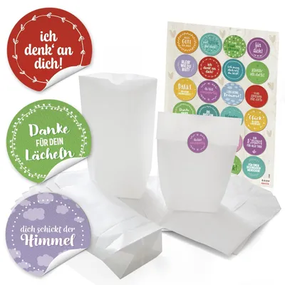 Produktbild von 24 weiße Gastgeschenk Papiertüten Papier-Beutel 16,5 x 26 x 6,6 cm + 24 runde Aufkleber 4 cm schwarz weiß - Danke + SCHÖN DASS DU DA BIST als Gastgeschenke Verpackung, give-awaysSprüche