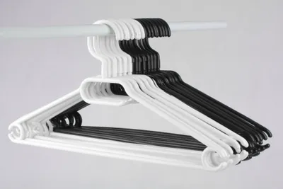Produktbild von SEVICO Kunststoff Kleiderbügel 100 Stück Weiß Wäschebügel Bügel drehbarer Garderobenbügel Hosenbügel W5-B-100X