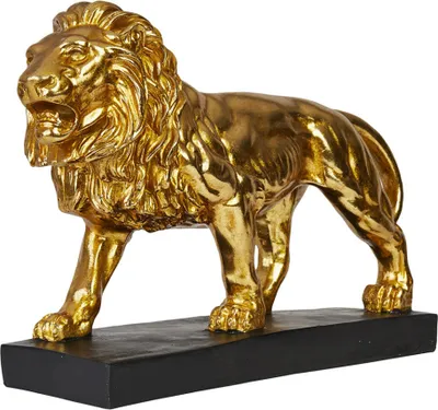 A golden lion sculpture on a black base.