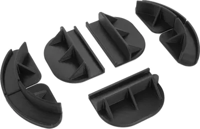 A set of black plastic mounting brackets for LED light strips.