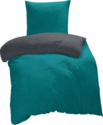 A folded duvet and pillow in teal and gray.