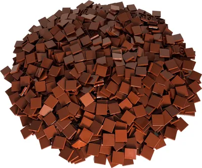 A pile of small, square, brown tiles.