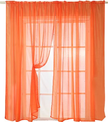 Two sheer orange curtains are hung over a window with multiple panes. One curtain is tied back with a fabric tie.