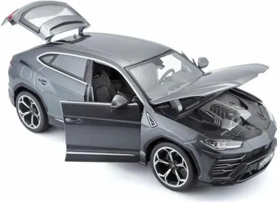 A gray Lamborghini Urus model car with its doors, hood, and rear hatch open, displayed against a white background.