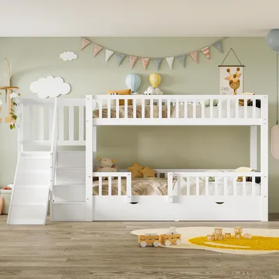 A white bunk bed with a slide and stairs in a child's bedroom.
