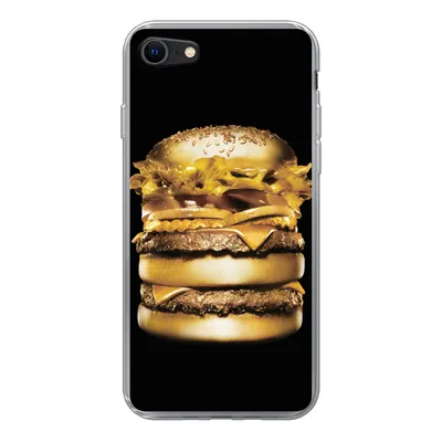 A close-up of a golden hamburger on a black background, displayed on a clear phone case.