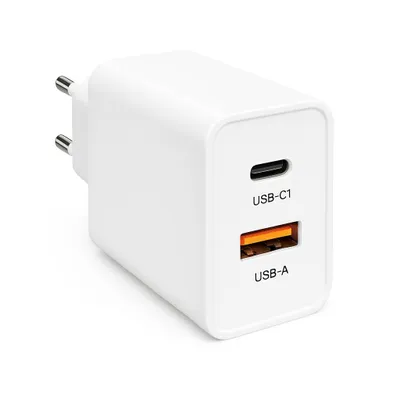 A white USB charger with two ports.