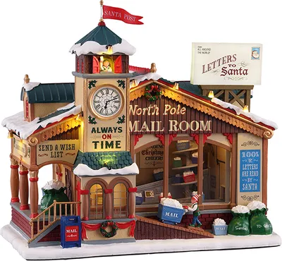 A detailed miniature model of the North Pole Mail Room, decorated for Christmas.