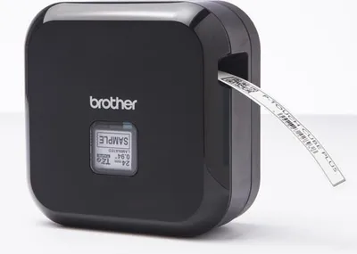A black Brother P-Touch Cube Plus label maker with a label tape emerging from the side.