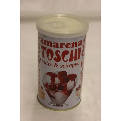 A can of amarena cherries with syrup on a white surface.