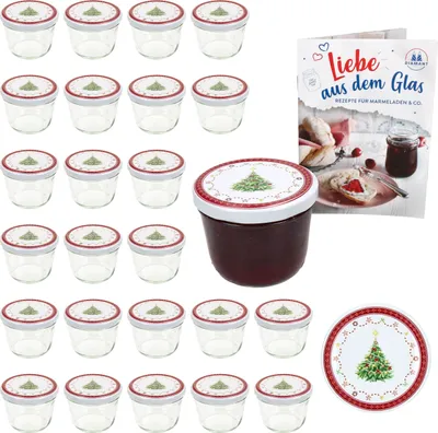 A set of glass jars with lids, a recipe book, and a single filled jar.